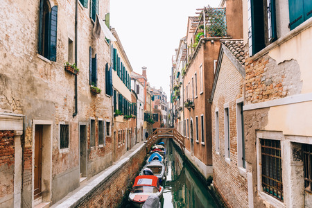 narrow streets and canals of Venice Italyの写真素材