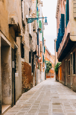 tourist routes of the old Venice streets of Italyの写真素材