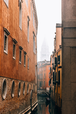 narrow streets and canals of Venice Italyの写真素材