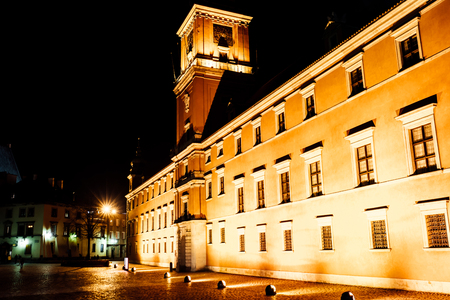 tourist area of the old town in night Warshawa Polandの写真素材