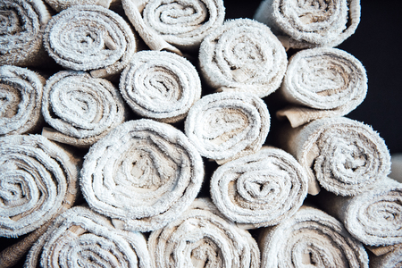 white clean barberman towels rolled into a cylinderの写真素材