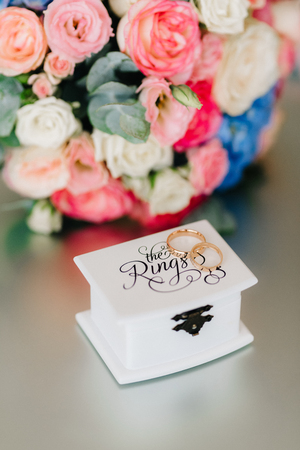 wedding rings with a wedding decorの写真素材