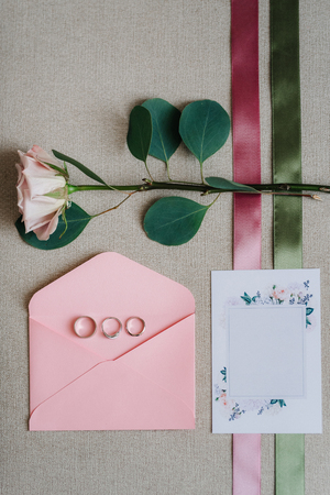 wedding rings with a wedding decorの写真素材