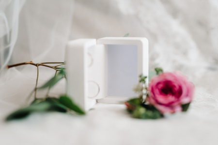 wedding rings with a wedding decorの写真素材