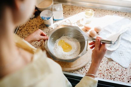 cooking breakfast in the kitchenの写真素材