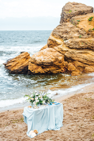 wedding ceremony area on the sandy beach near the oceanの写真素材