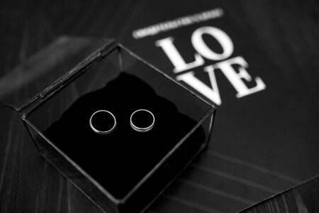 wedding rings with a wedding decorの写真素材
