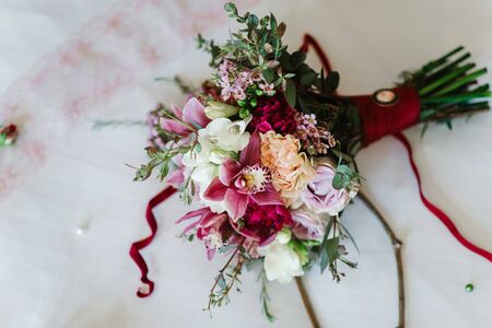 elegant wedding bouquet of fresh natural flowers and greeneryの写真素材