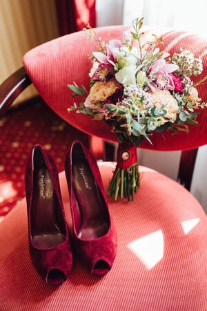 elegant wedding bouquet of fresh natural flowers and greeneryの写真素材