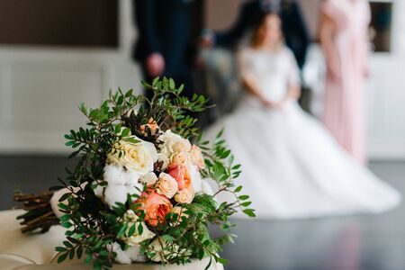 elegant wedding bouquet of fresh natural flowers and greenery