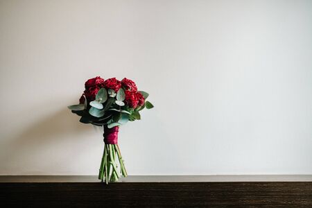elegant wedding bouquet of fresh natural flowers and greeneryの写真素材
