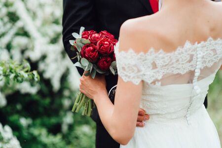elegant wedding bouquet of fresh natural flowers and greenery