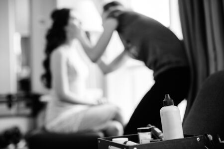 set make-up brushes and shadows on the tableの写真素材