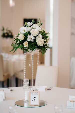 elegant wedding decorations made of natural flowers and green elementsの写真素材