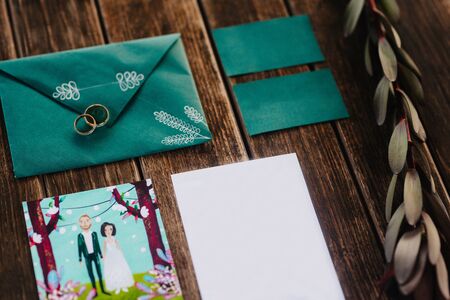 gold wedding rings as an attribute of a young couple's weddingの写真素材