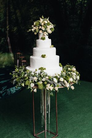 festive wedding sponge cake with white icing creamの写真素材