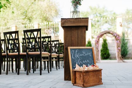 wedding ceremony in the woods among the trees on the green trackの写真素材