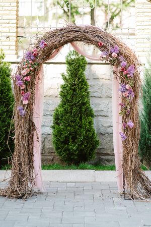 wedding ceremony in the woods among the trees on the green trackの写真素材