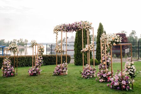 wedding ceremony in the woods among the trees on the green trackの写真素材