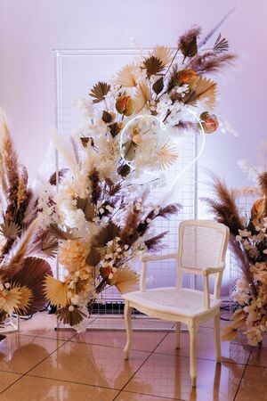 elegant wedding decorations made of natural flowers and green elementsの写真素材