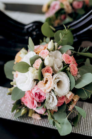 elegant wedding bouquet of fresh natural flowers and greeneryの写真素材