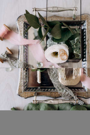 wedding rings with a wedding decorationの写真素材