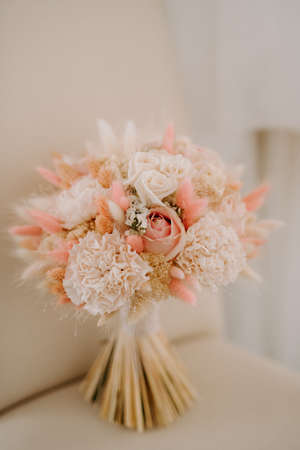 elegant wedding bouquet of fresh natural flowers and greeneryの写真素材