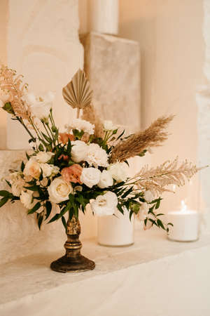 elegant wedding decorations made of natural flowers and green elementsの写真素材