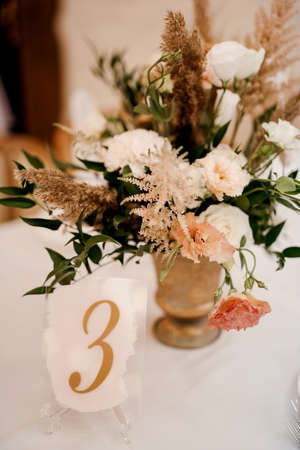 elegant wedding decorations made of natural flowers and green elementsの写真素材