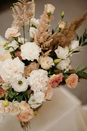 elegant wedding decorations made of natural flowers and green elementsの写真素材