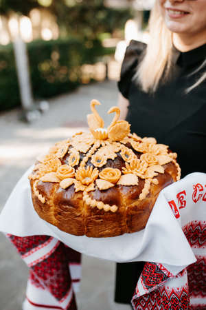 wedding bread loaf with voluminous twisted pigtails and decorationsの写真素材