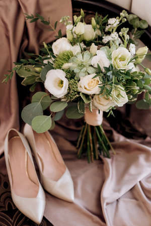 elegant wedding bouquet of fresh natural flowers and greeneryの写真素材
