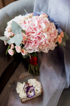 elegant wedding bouquet of fresh natural flowers and greeneryの写真素材