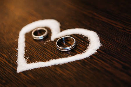 wedding rings with a wedding decorの写真素材