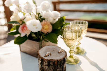 wedding rings with a wedding decorの写真素材