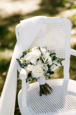 elegant wedding bouquet of fresh natural flowers and greeneryの写真素材