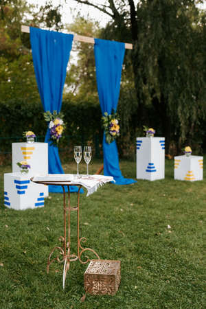 wedding ceremony in the woods among the trees on the green trackの写真素材