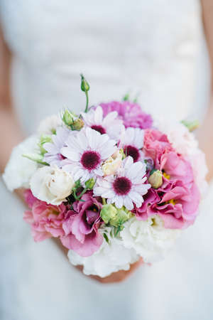 elegant wedding bouquet of fresh natural flowers and greeneryの写真素材