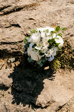 elegant wedding bouquet of fresh natural flowers and greeneryの写真素材