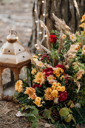 elegant wedding decorations made of natural flowers and green elementsの写真素材
