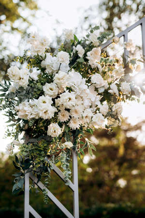 elegant wedding decorations made of natural flowers and green elementsの写真素材