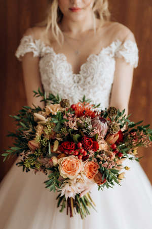 bridal bouquet in red autumn shades of Kenyan dried flowersの写真素材