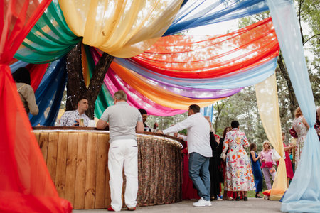 outdoor round wooden bar with colorful ribbons in maracan colorsのeditorial素材