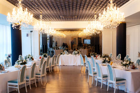 The presidium of the newlyweds in the banquet hall of the restaurant is decoratedの写真素材