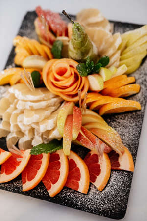 welcome buffet with alcohol and snacks, sandwiches, cupcakesの写真素材