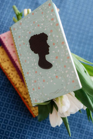 elegant wedding bouquet of fresh natural flowers and greenery with bookの写真素材