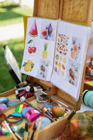 artist's brushes and paints for thematic body paintingの写真素材