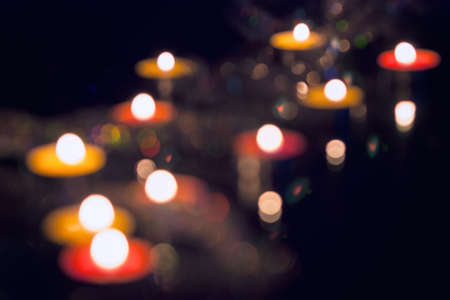 christmas candles close up on dark backgroundの写真素材