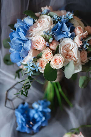 elegant wedding bouquet of fresh natural flowers and greeneryの写真素材