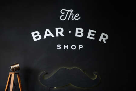 the tools of a Barber on the desktop in front of the mirrorの写真素材